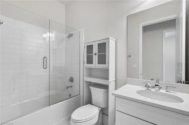 a view of a livingroom with a wooden floor and a window