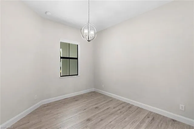 a view of a back yard of the house