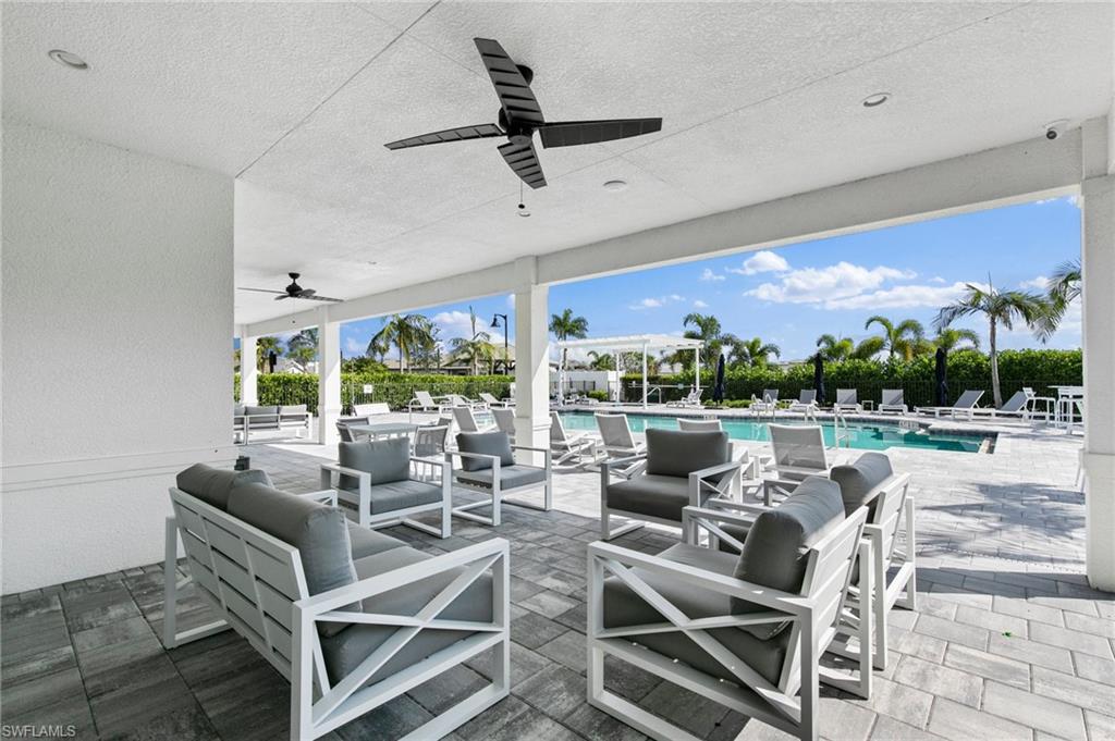 14756 Kingfisher Loop Naples, FL 34120 - Photo 27 of 31 a view of a dining room with furniture window and outside view