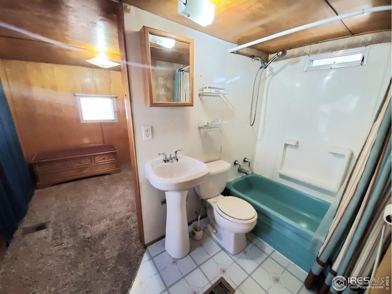1700 Laporte Avenue, Unit 4 Fort Collins, CO 80521 - Photo 13 of 25 a bathroom with a sink toilet and shower