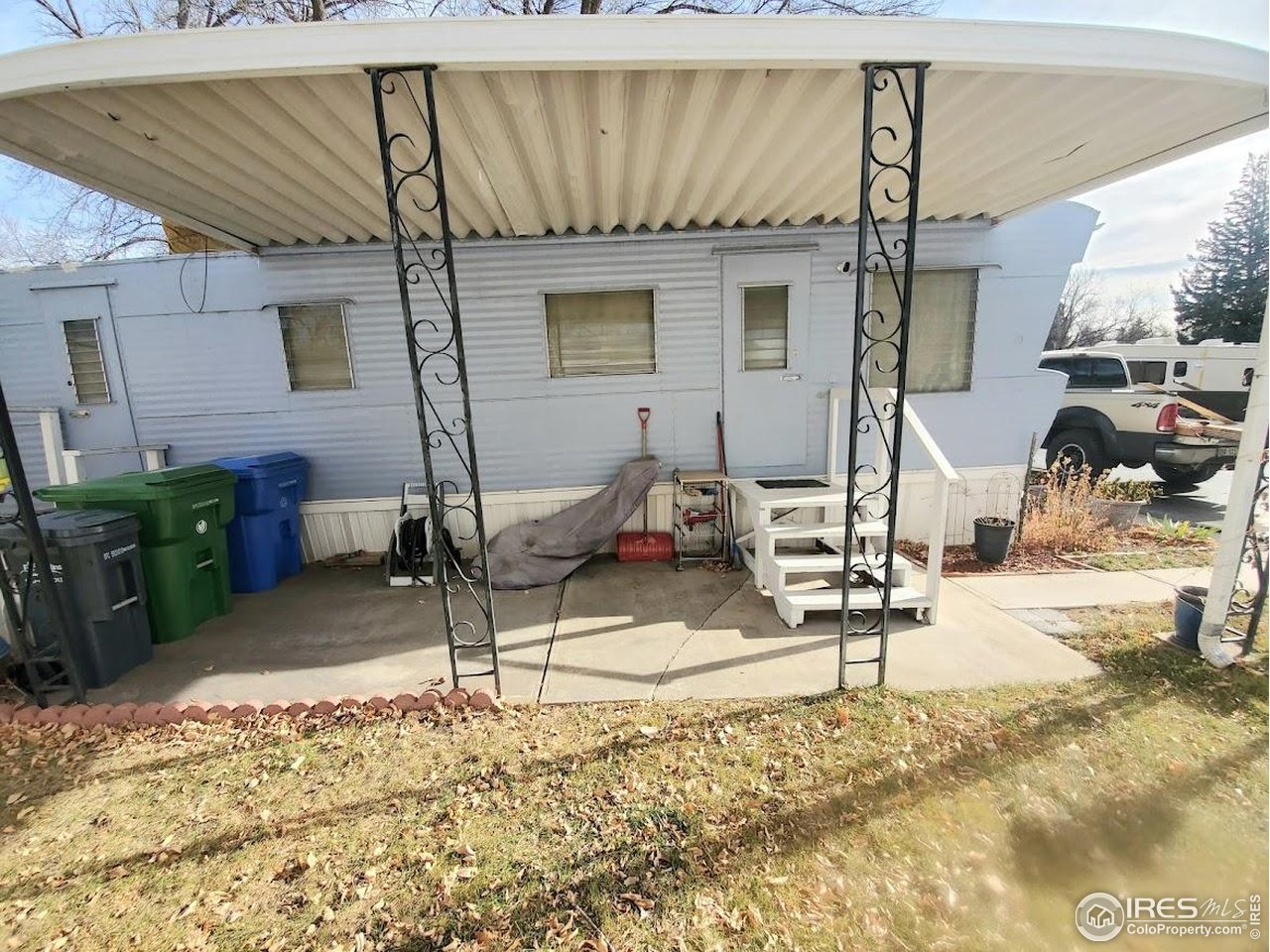 1700 Laporte Avenue, Unit 4 Fort Collins, CO 80521 - Photo 2 of 25 a view of a patio with a table and chairs