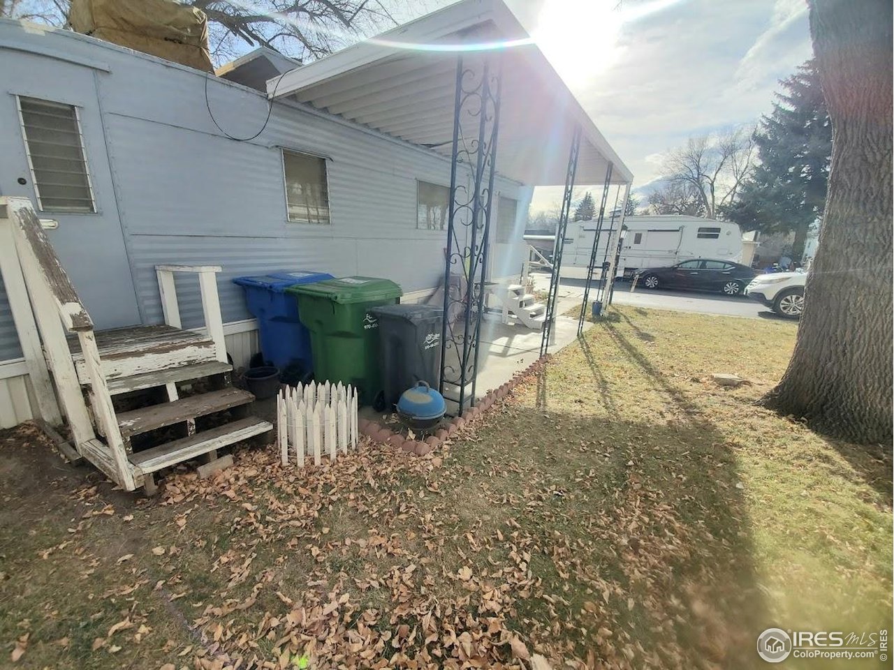 1700 Laporte Avenue, Unit 4 Fort Collins, CO 80521 - Photo 21 of 25 a view of a patio with a table and chairs