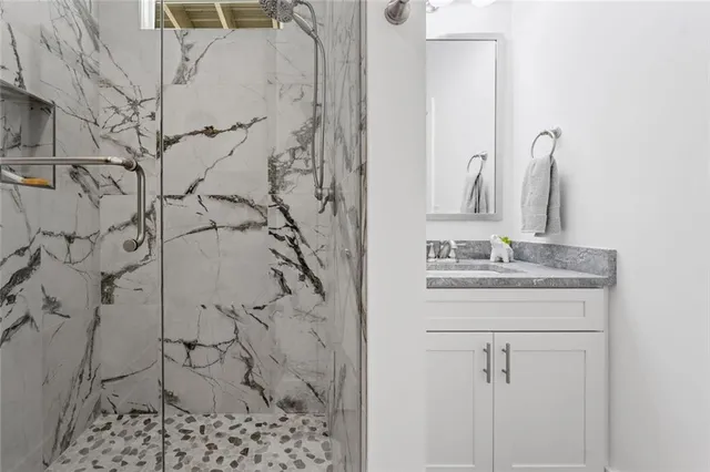 a view of a chairs and table in patio with wooden floor