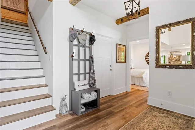 a bedroom with a large bed and a window