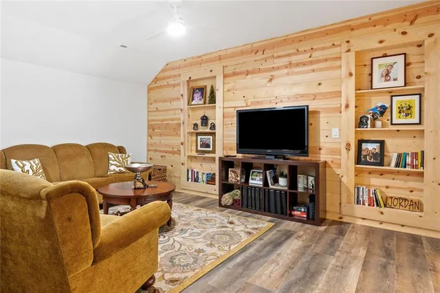 a view of a balcony with wooden floor