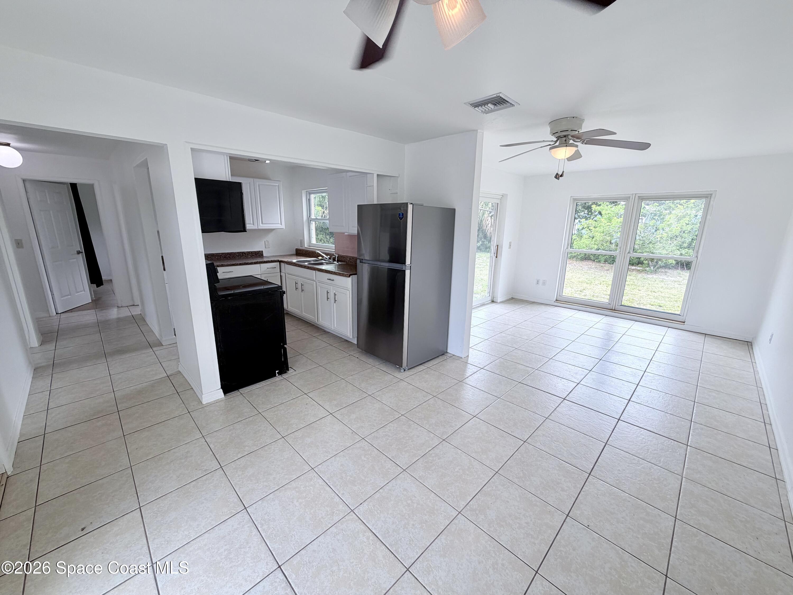 2107 Little John Road Melbourne, FL 32935 - Photo 4 of 26 IMG_2227