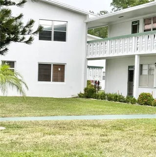 a view of a terrace with a garden