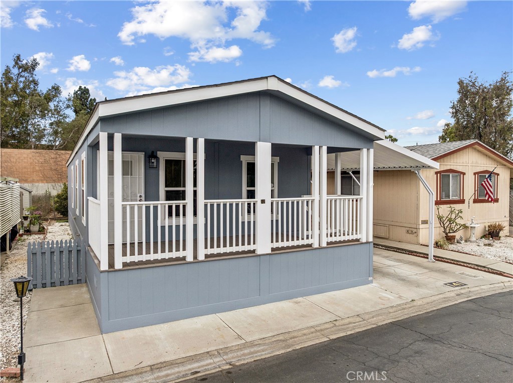 10550 Dunlap Crossing Road, Unit 141 Whittier, CA 90606 - Photo 29 of 38 a view of a house with a outdoor space