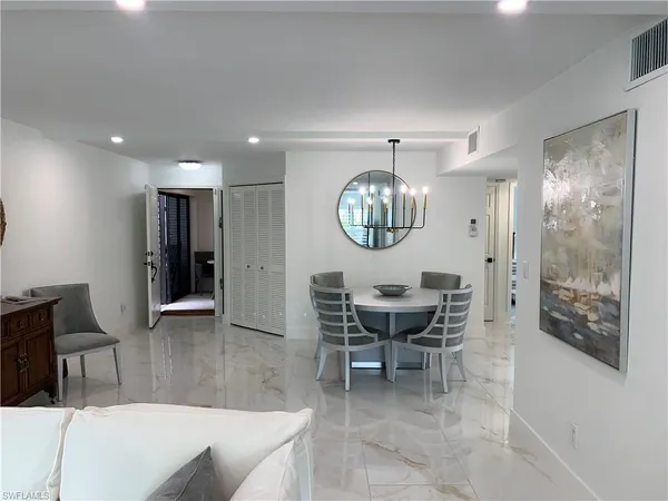 a view of a dining room with furniture