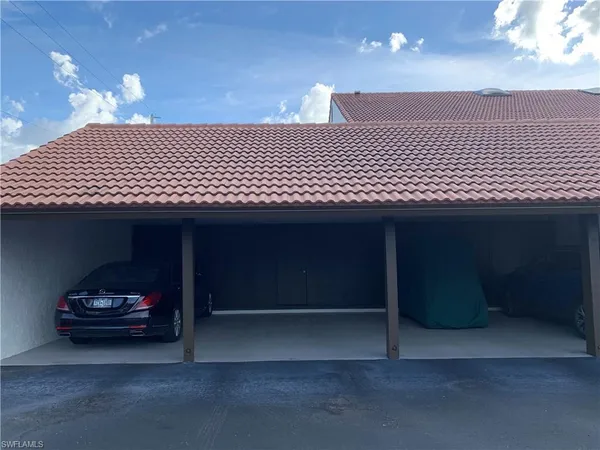 a car parked in front of a building