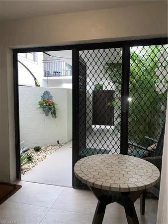 a table that has a table and a chair with wooden floor