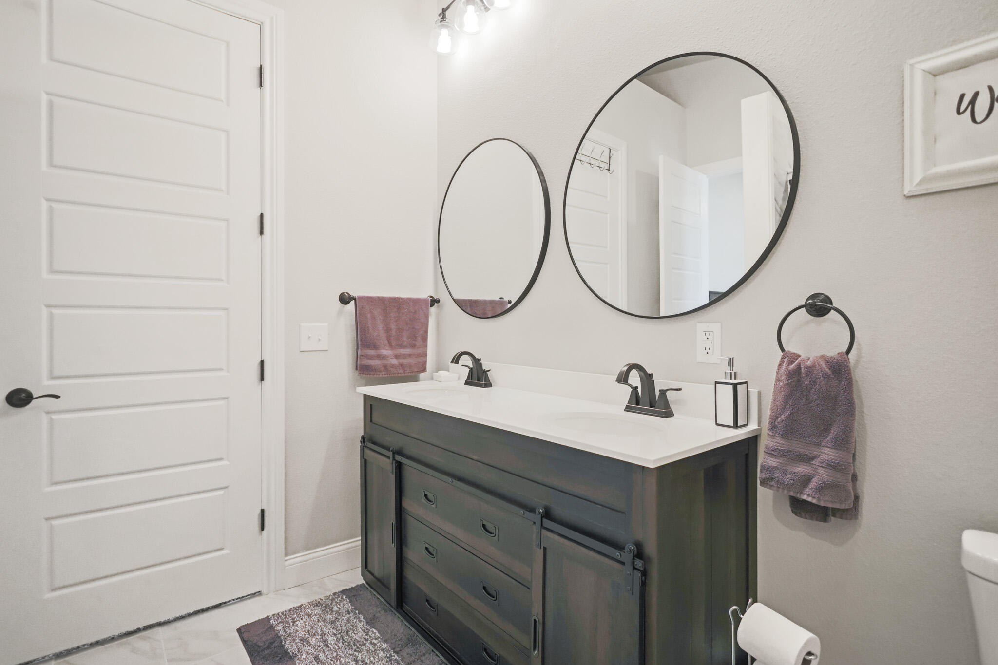 301 Fagan Road Snyder, TX 79549 - Photo 60 of 102 a bathroom with a sink and a mirror