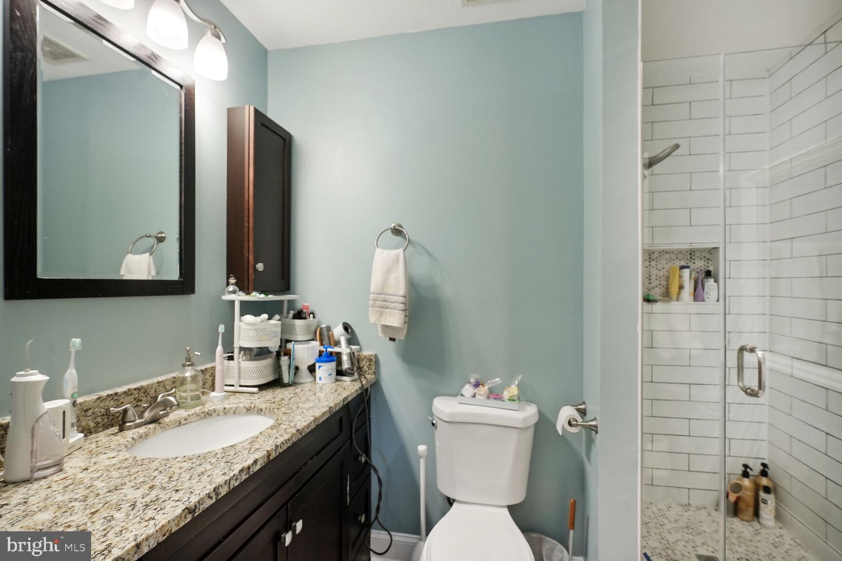 803 9th Street Northeast Washington, DC 20002 - Photo 13 of 22 Primary ensuite bathroom w/separate shower