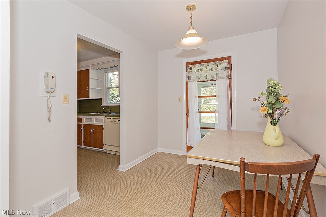 1672 Oakmount Road South Euclid, OH 44121 - Photo 6 of 30 The door is the walk-out to the charming enclosed porch...