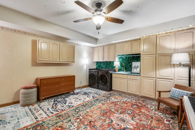 a kitchen with a refrigerator and a sink