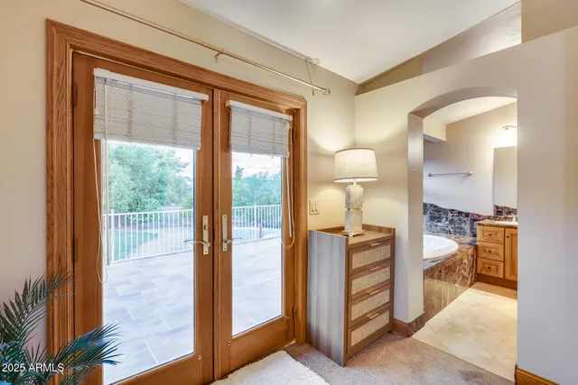 a view of a bathroom from the hallway
