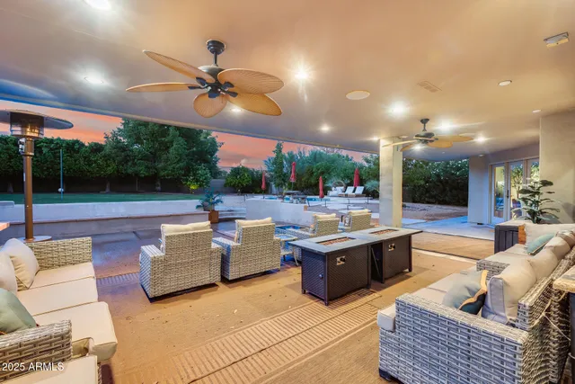 a view of outdoor space with green field in middle