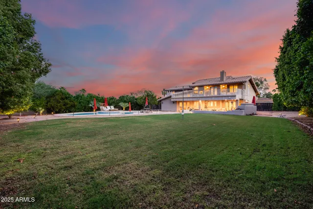 a view of a park with large trees