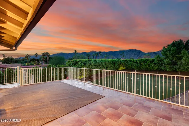 an aerial view of residential houses and street