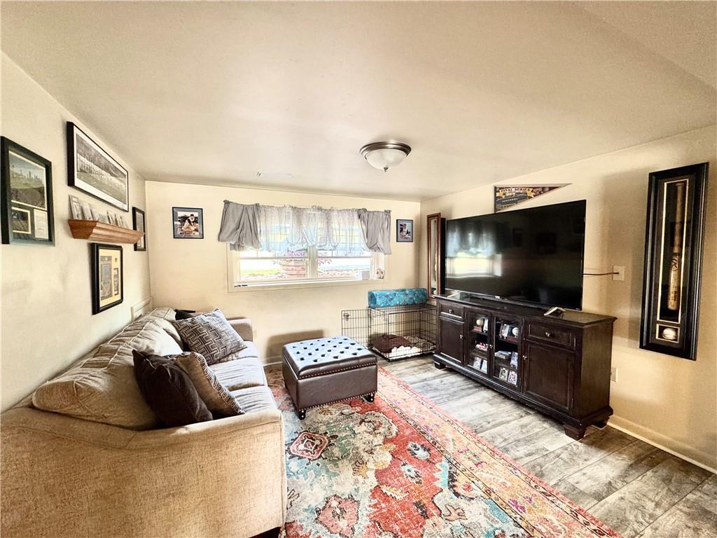 824 Shenango Road New Castle, PA 16101 - Photo 20 of 34 a living room with furniture and a flat screen tv