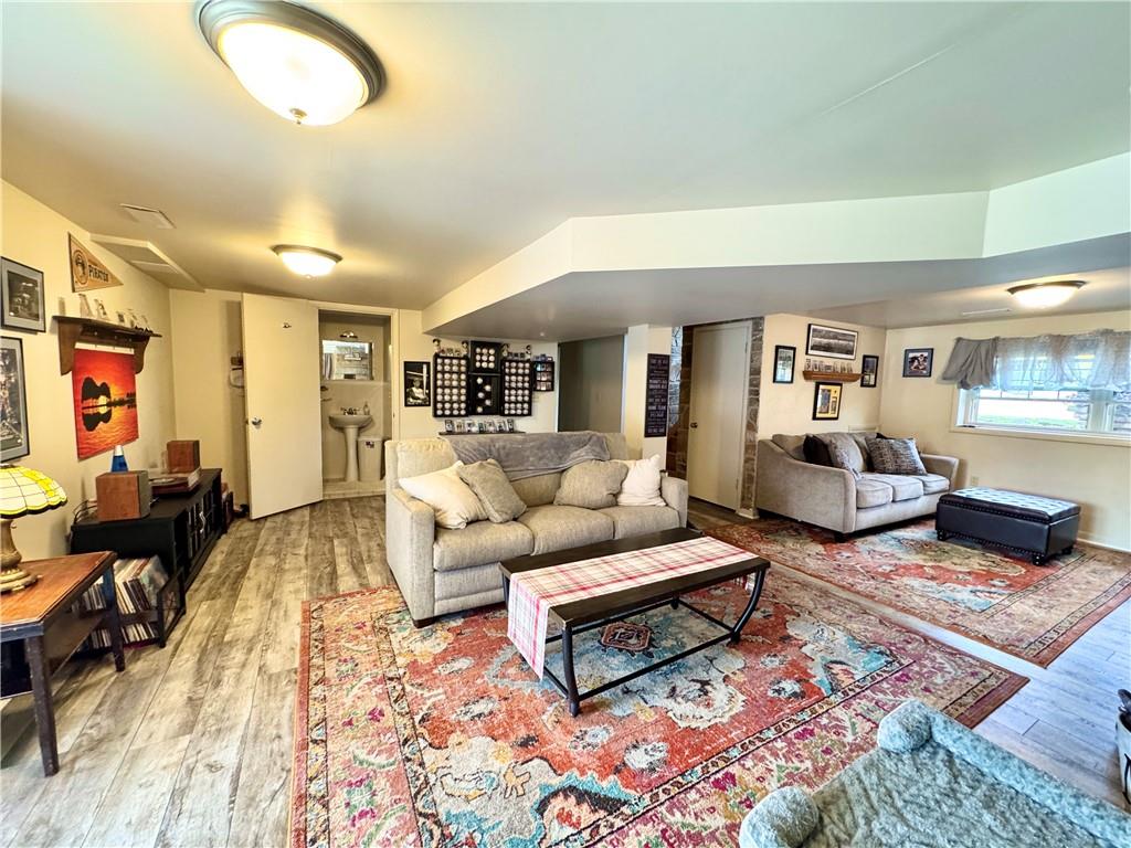 824 Shenango Road New Castle, PA 16101 - Photo 22 of 34 a living room with furniture and a rug