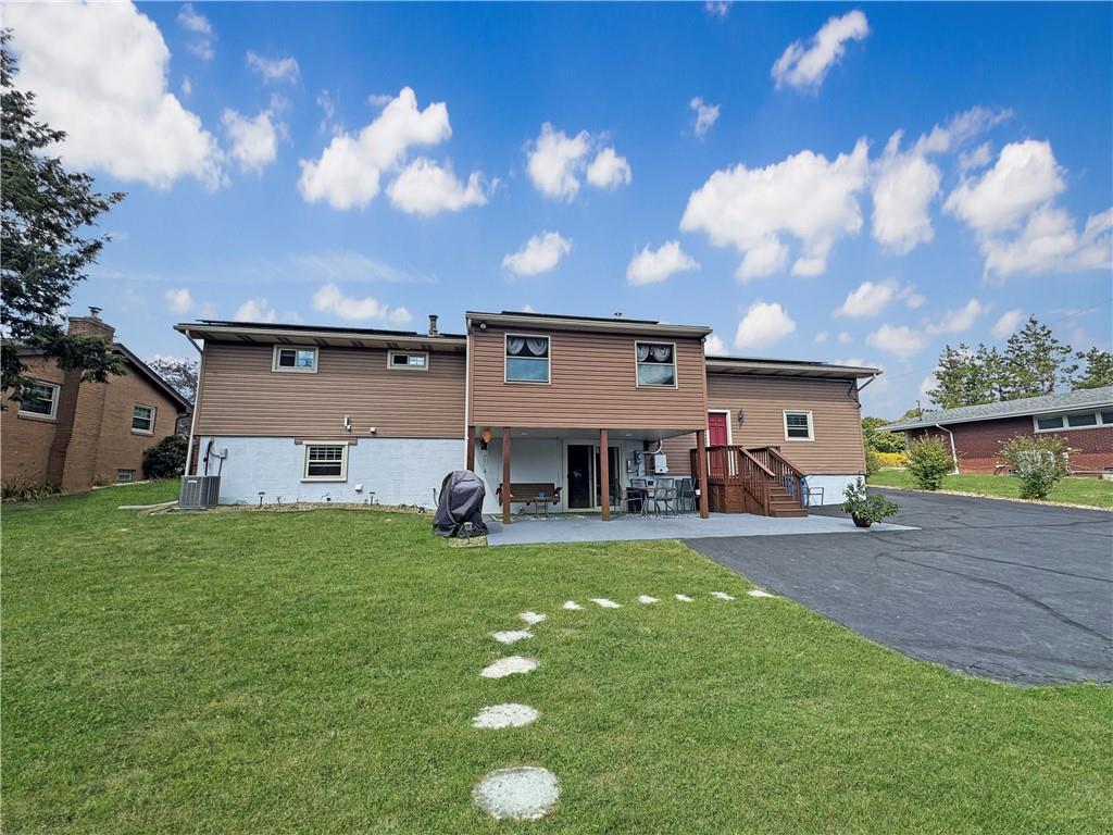 824 Shenango Road New Castle, PA 16101 - Photo 28 of 34 a view of a house with a yard and sitting area
