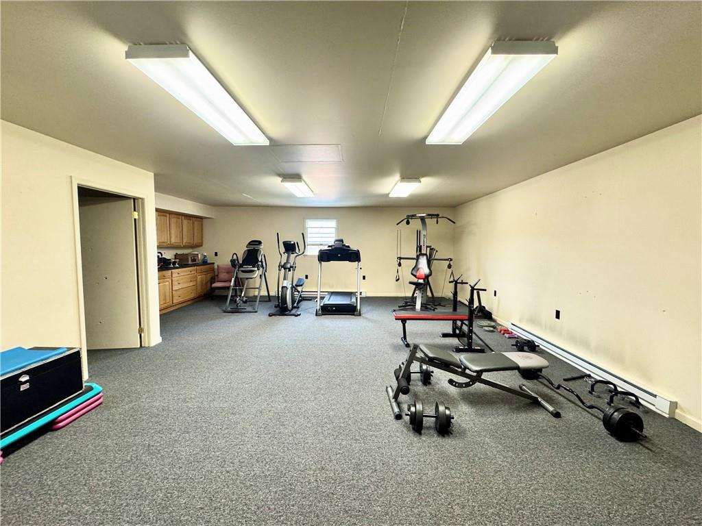 824 Shenango Road New Castle, PA 16101 - Photo 30 of 34 a room with gym equipment and a window