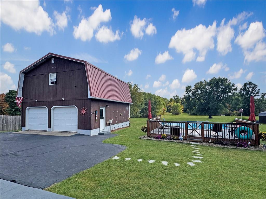 824 Shenango Road New Castle, PA 16101 - Photo 32 of 34 a front view of a house with garden