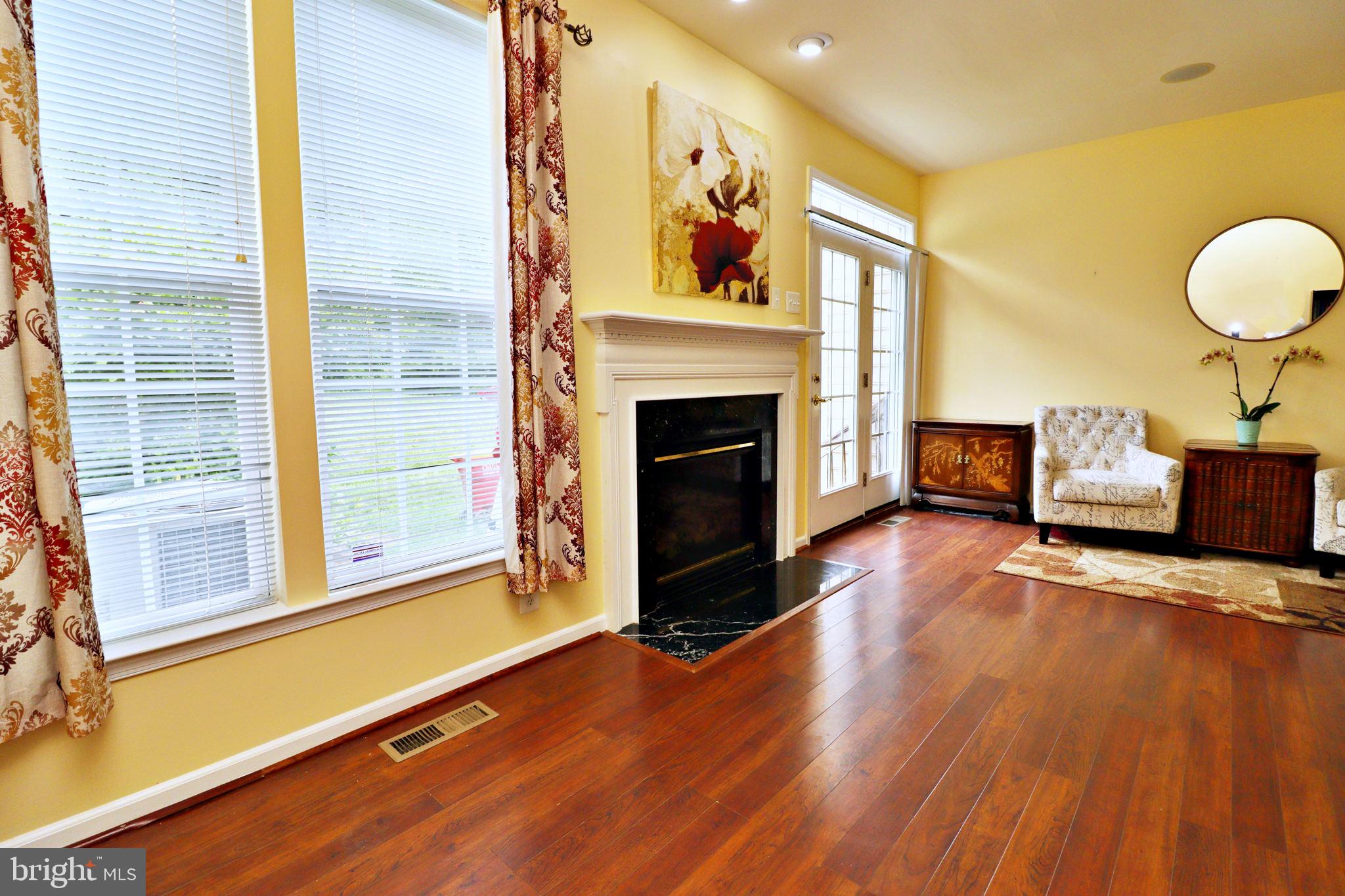 153 Riparian Lane Ranson, WV 25438 - Photo 27 of 62 Morning Room with Gas Fireplace