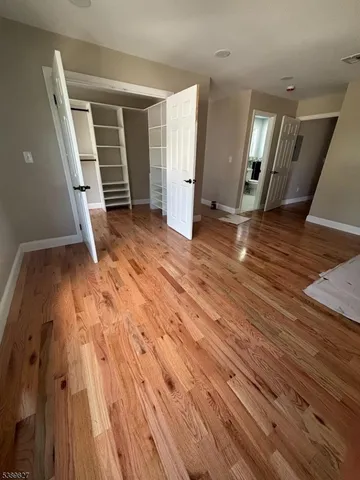 a balcony with wooden floor