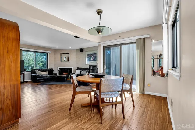 a view of a balcony with chair and table