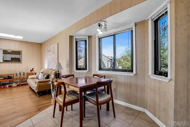 a kitchen with a stove a sink and a refrigerator