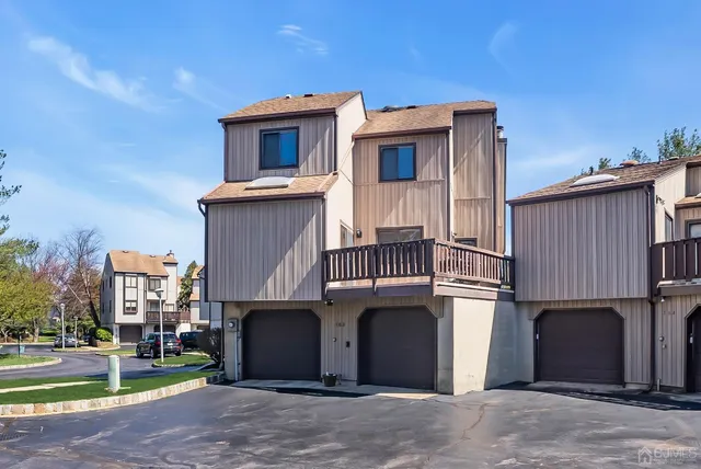 an aerial view of a house having patio