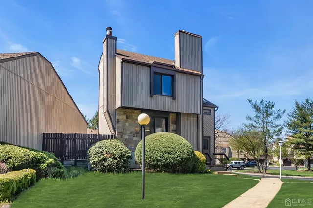 a house view with a garden space