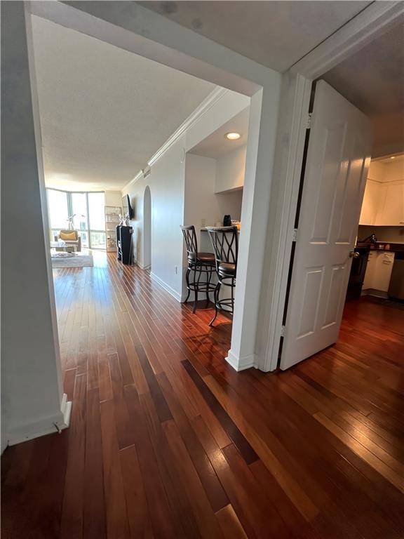 a view of a living room and hardwood floor