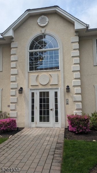 16 Cellar Avenue, Unit 16 Clark, NJ 07066 - Photo 3 of 12 a front view of a house with a yard