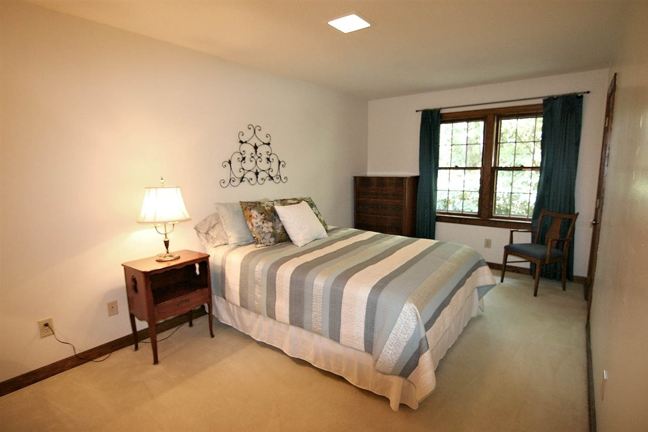 8005 Shellnut Road Raleigh, NC 27615 - Photo 14 of 25 The First Floor Bedroom is Extra Large + has a Lighted Walk-in Closet. 1st Floor Bedroom
