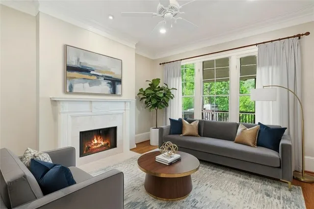 a living room with furniture and a window