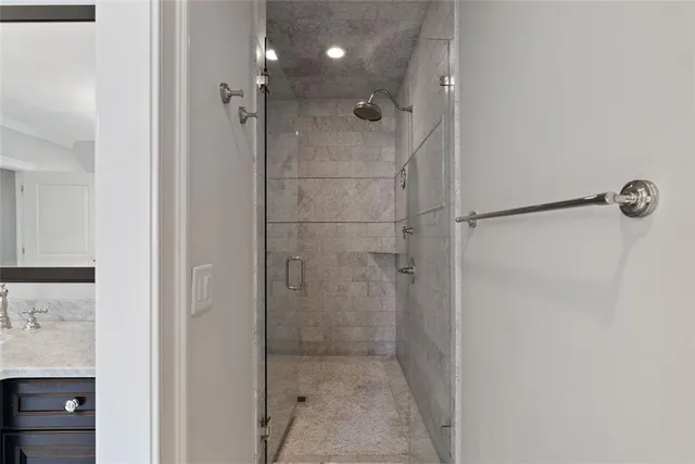 a kitchen with granite countertop a sink a counter top space and dining table