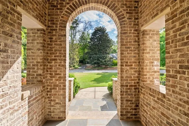 a view of a wooden door with a shower