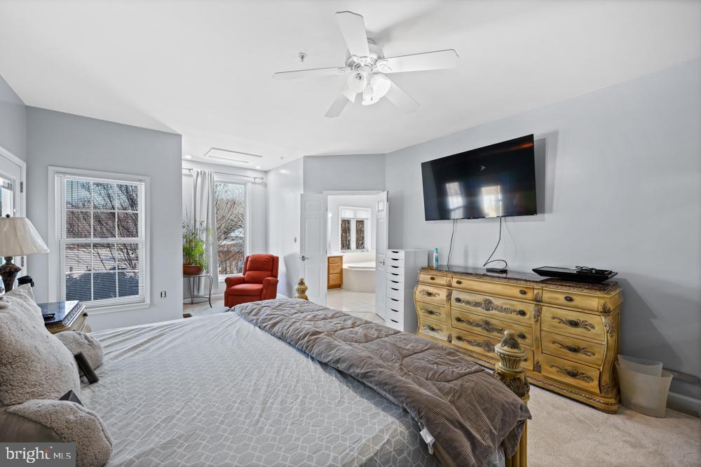 13710 Baden Naylor Road Upper Marlboro, MD 20772 - Photo 26 of 66 a bedroom with a bed and a flat screen tv