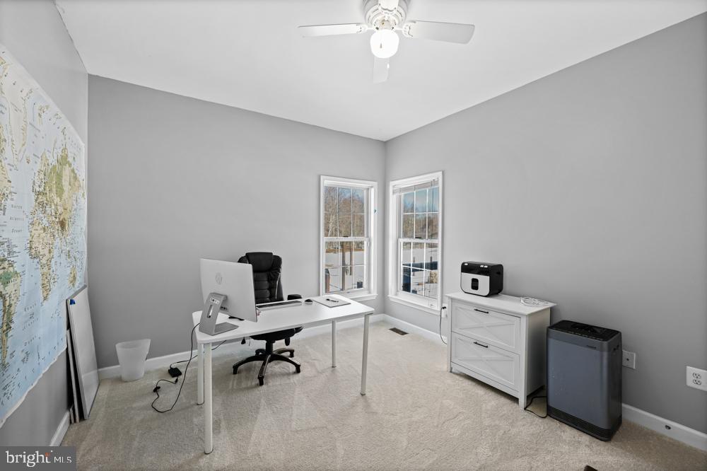 13710 Baden Naylor Road Upper Marlboro, MD 20772 - Photo 37 of 66 a view of a workspace with furniture