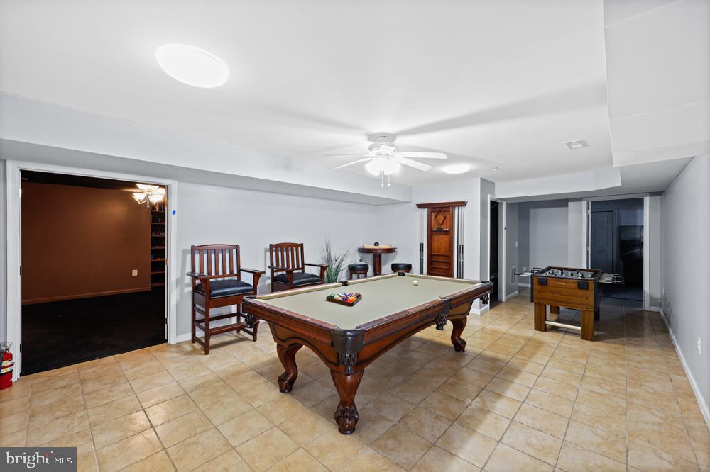13710 Baden Naylor Road Upper Marlboro, MD 20772 - Photo 43 of 66 a living room with furniture a dining table and chairs with wooden floor