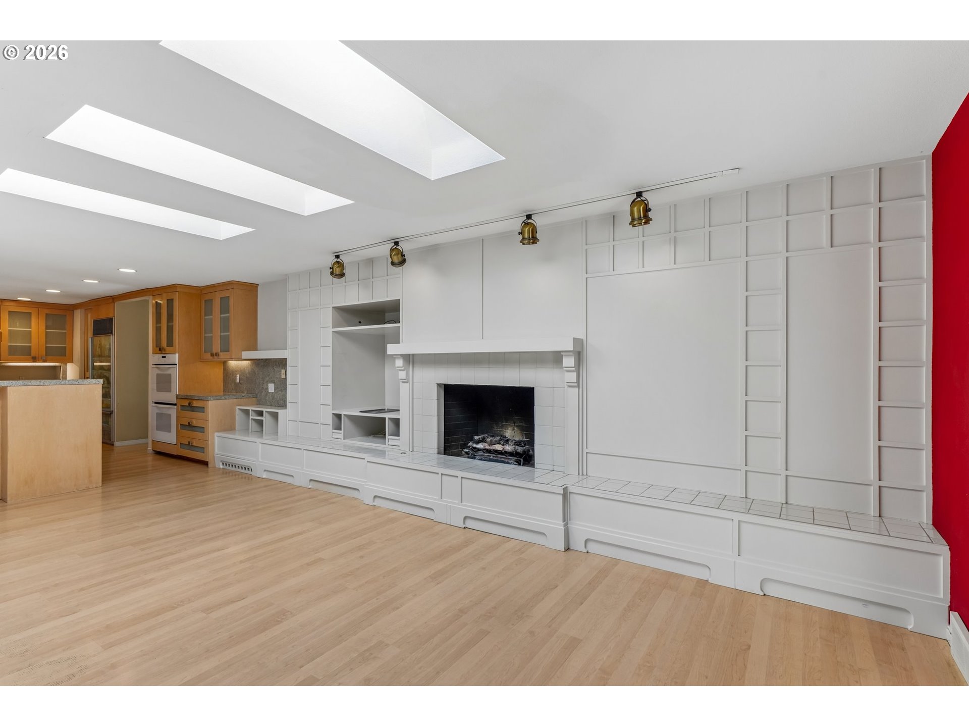 7600 Southwest Northvale Way Portland, OR 97225 - Photo 19 of 46 a view of an empty room with a fireplace