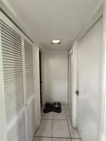 a bathroom with a sink and shower