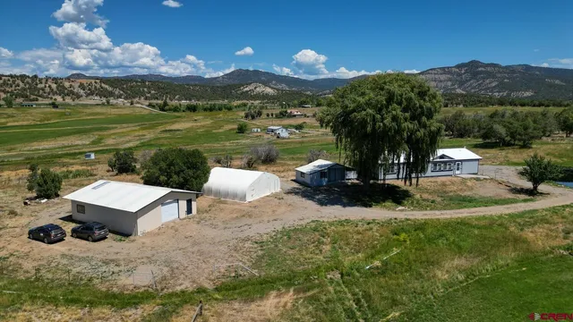 a view of a table and chairs in patio
