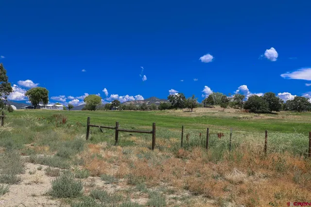 a view of a lake with a mountain in the background