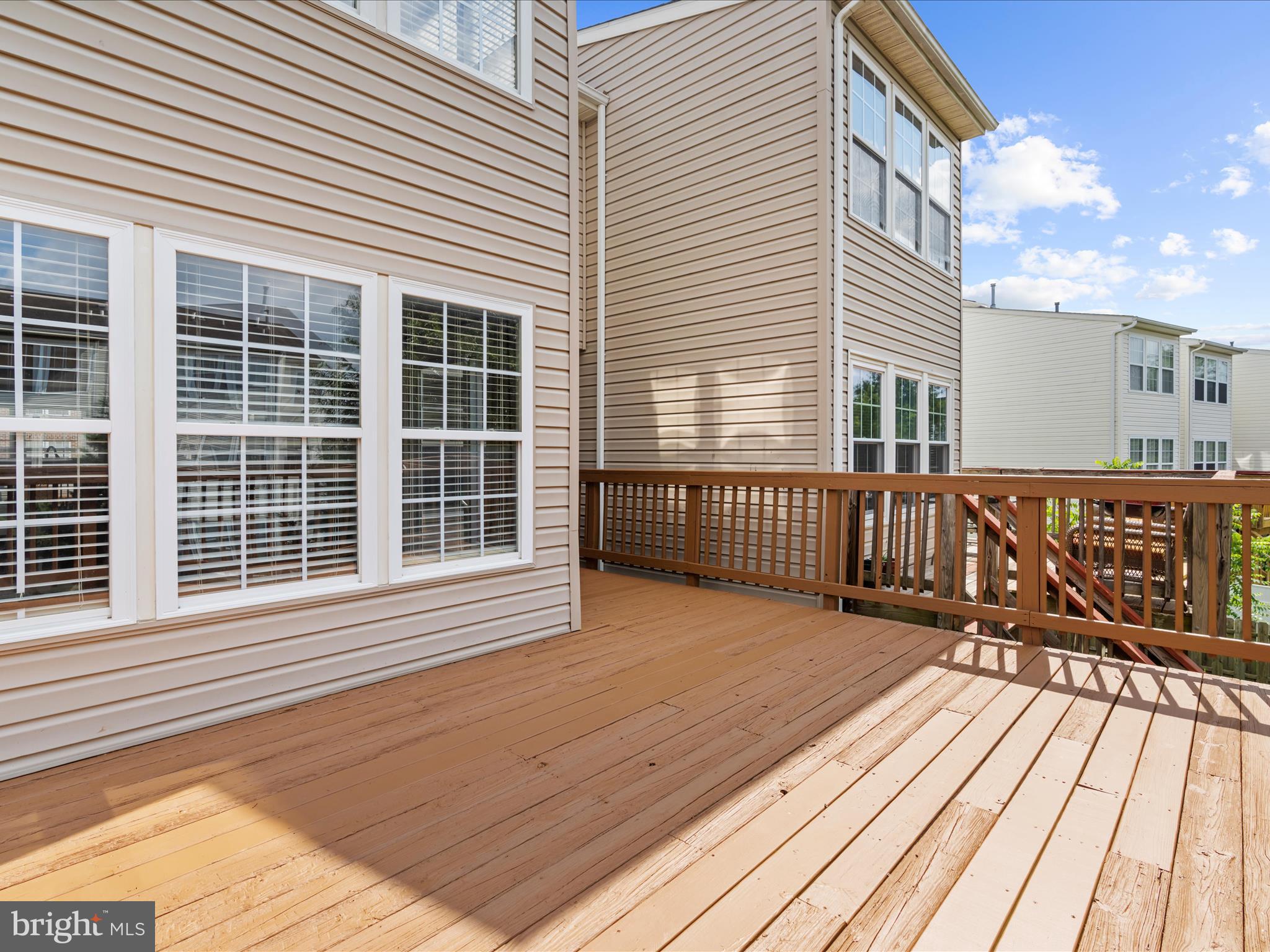 9865 Decatur Road Middle River, MD 21220 - Photo 39 of 63 a view of a house with wooden deck
