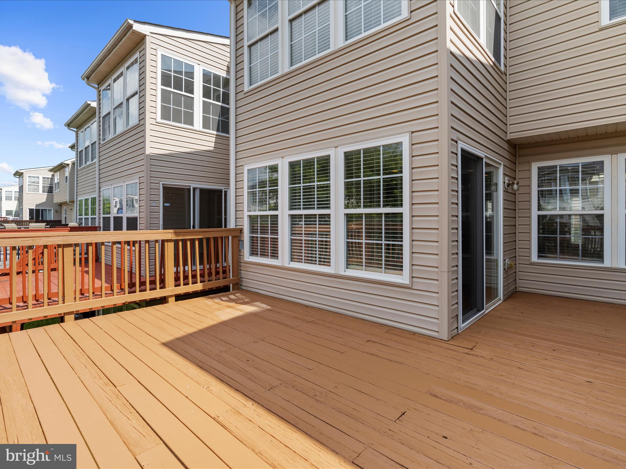 9865 Decatur Road Middle River, MD 21220 - Photo 40 of 63 a view of a house with wooden deck