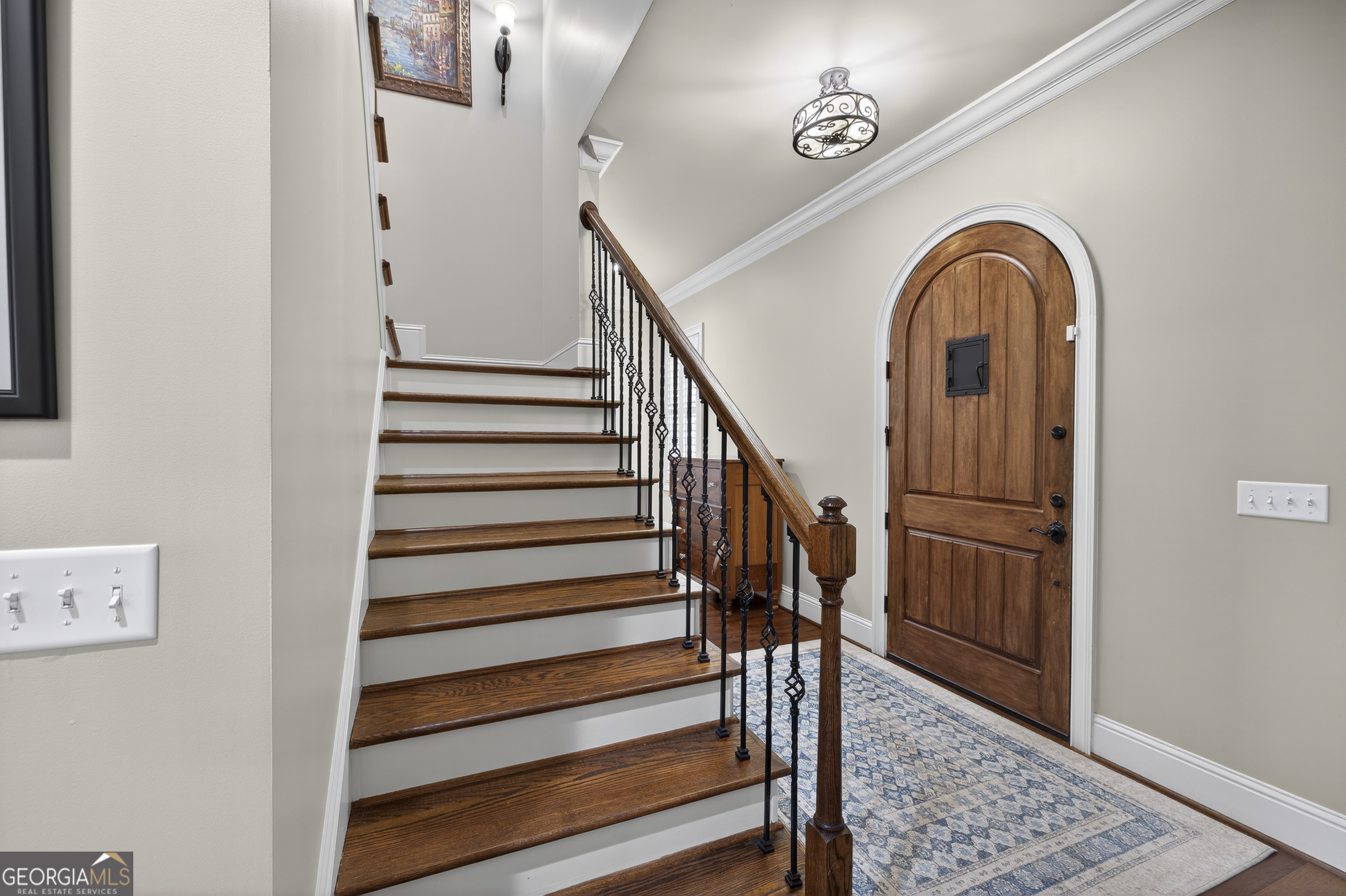 238 Cold Branch Road Eatonton, GA 31024 - Photo 36 of 104 a view of entryway with stairs and wooden floor